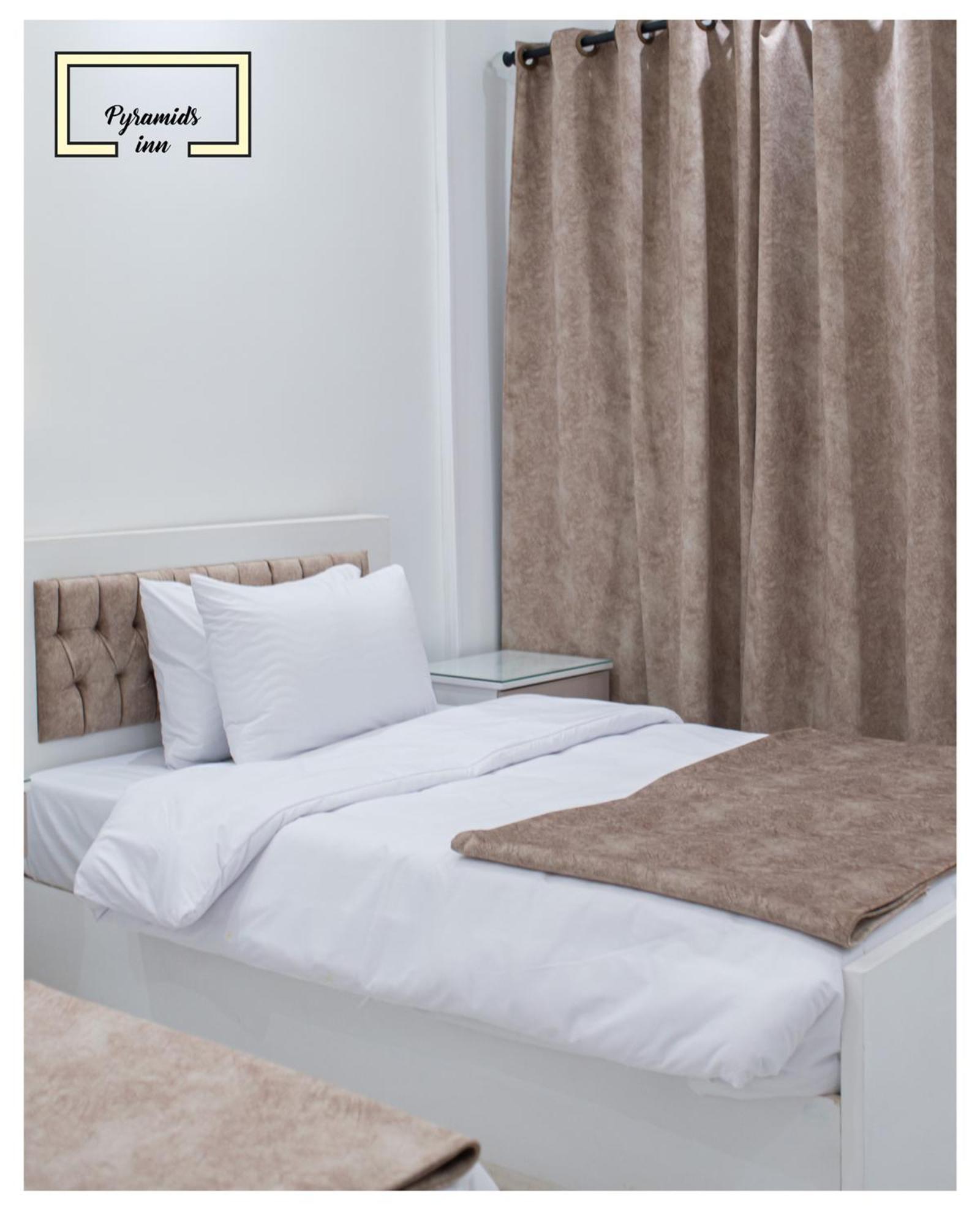 Egyptus Pyramids Inn Кайро Екстериор снимка